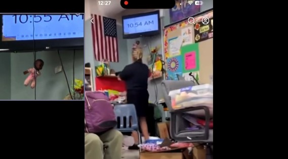 OMG! A Barrington Middle School Art Teacher  Was Filmed Hanging A Black Baby Doll In A Lynching Manner With A Charger Cord In The Classroom!